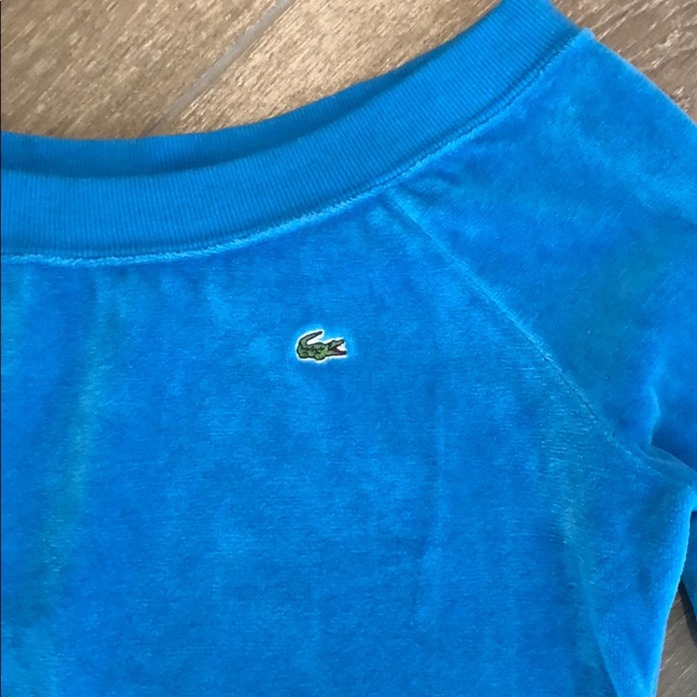 Retro Lacoste sweatshirt.
